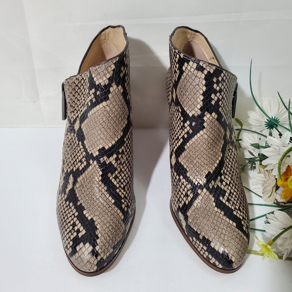 snakeskin wedge booties